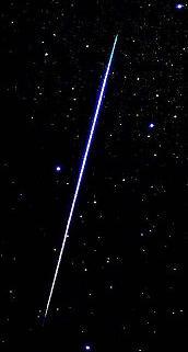 a Geminid meteor streaking through Ursa Major, courtesy Yukihiro Kida